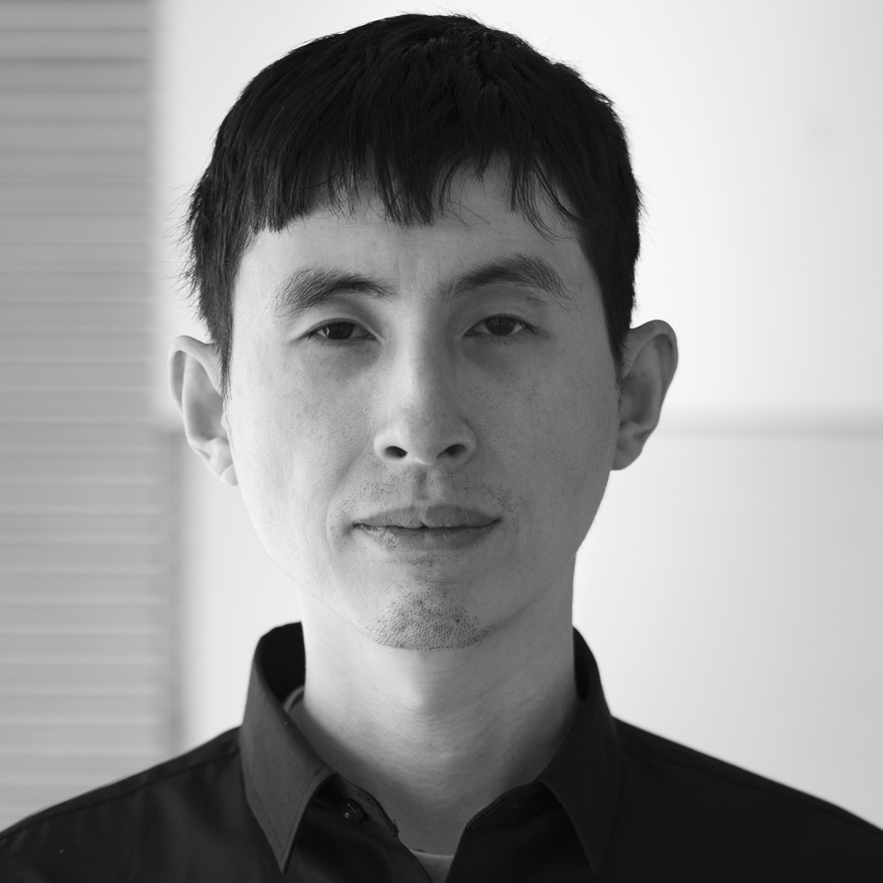 Black and white photo of Arnold Wang.