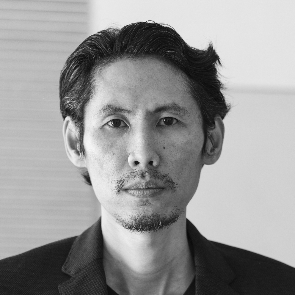 Black and white photo of Surachai Noppa.