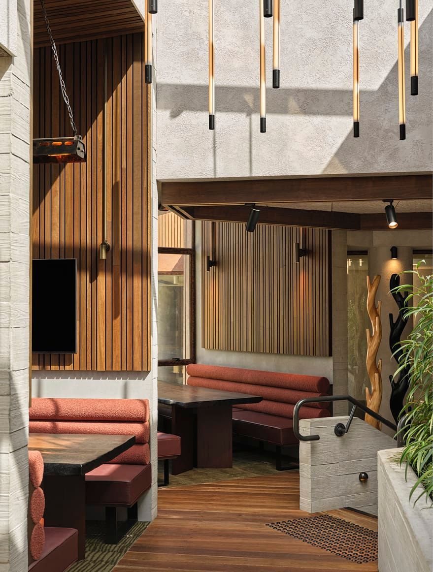 THE SOFT GLOW OF WARM L IGHTING CREATES INITMACY IN THE POD SPACES