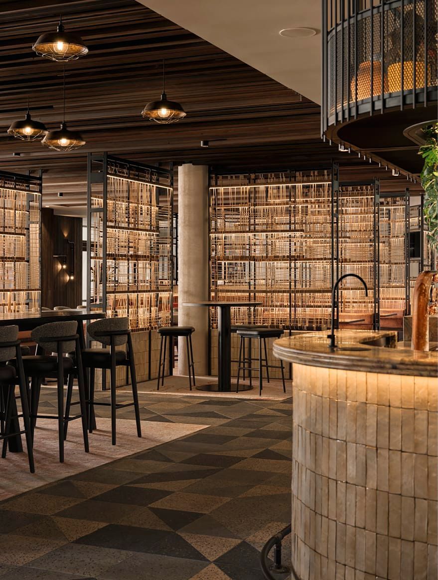 NATURAL AND TACTILE EARTHY MATERIALS IN FITOUT OF BAR, LOUNGE AND DINING SPACES