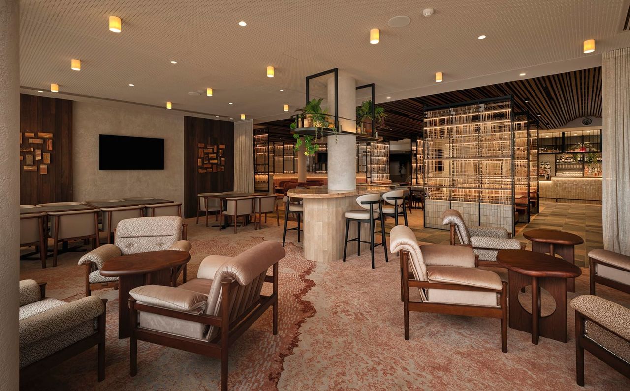 PRIVATE ROOM AND LOUNGE LOOKING TOWARDS MAIN CAFE AND BAR SPACE