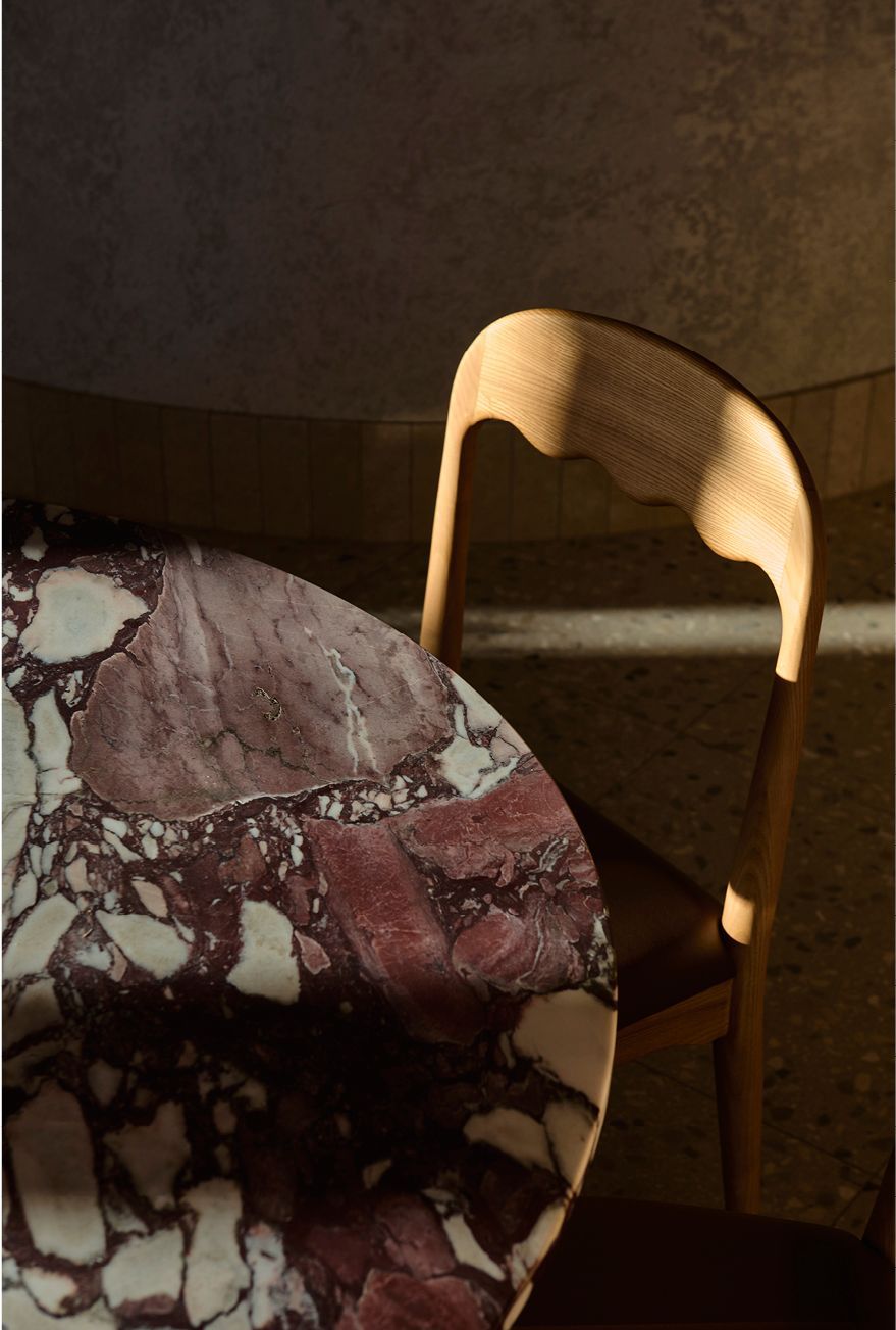 Wine-coloured finishes of the private dining space