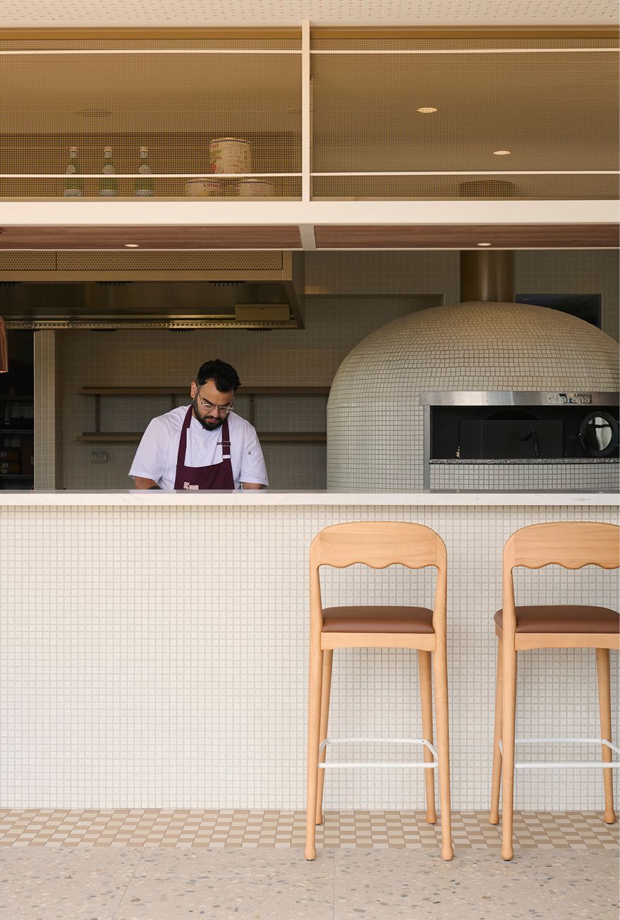 Light-filled dining completed with natural materials