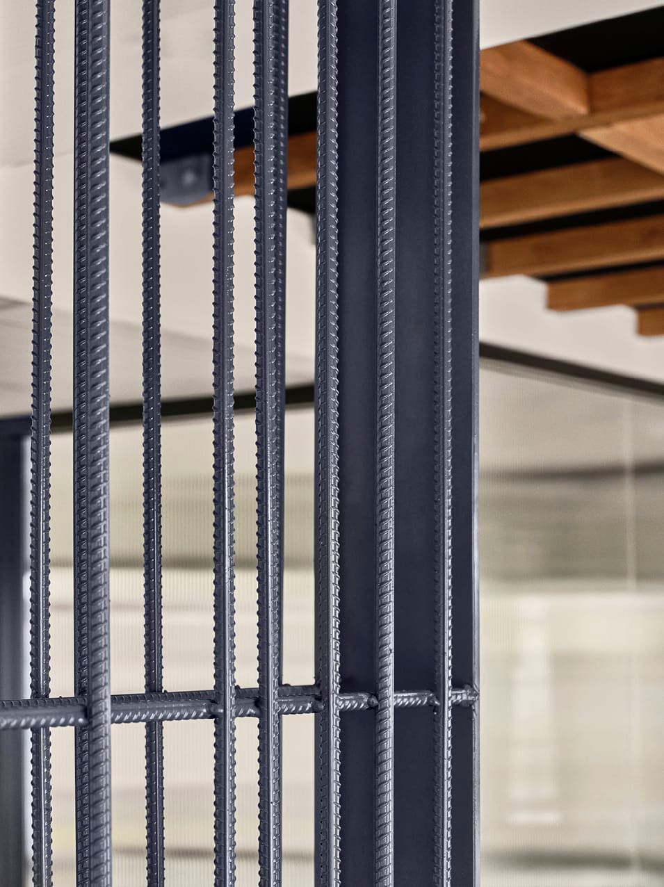 FITOUT DETAILS INCLUDING POWDER-COATED RE-BAR SCREEN AND FORM-PLY RECEPTION DESK