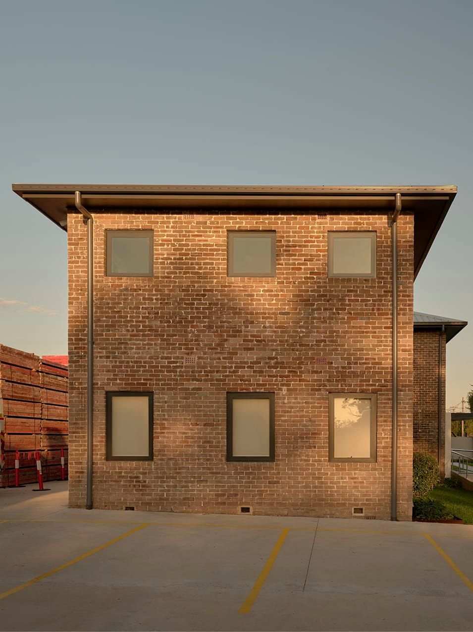 ORIGINAL BRICK BUILDING AND CONCRETE SHEETING MODERN EXTENSION